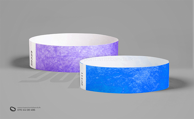 purple and blue solid colour paper hand bands / wristbands